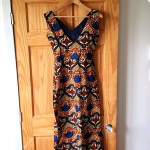 Very classy long wax dress. Made in Senegal.